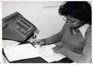 Michele Geers (Left), Accounting faculty member, helps a student with some classwork (ca. 1980s)